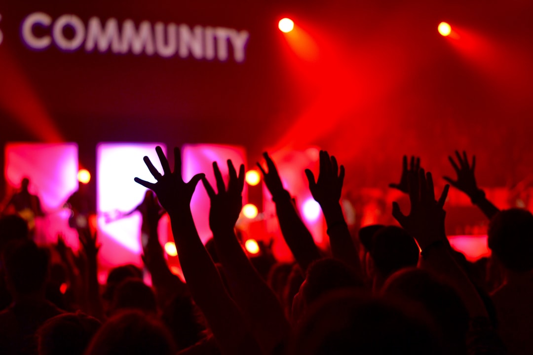 people-raises-hands-tzcppmjaohu
